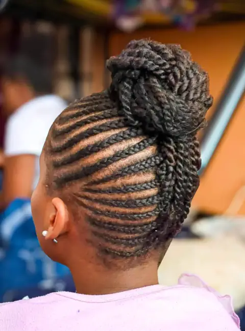 Braided bun updo with defined scalp rows